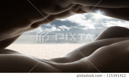Sculptural Horizon. Human body as landscape, framing serene beach scene through natural curves and contours of the body. Sculptural Horizon. Human body as landscape, framing serene beach scene through natural curves and contours of the body. 115391422