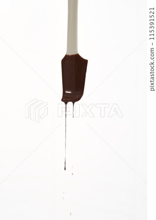 melted chocolate and rubber spatula 115391521