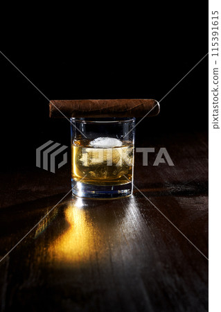 the composition of a glass of whiskey and cigar cigarettes with ice the composition of a glass of whiskey and cigar cigarettes with ice 115391615