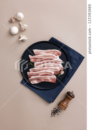 fresh pork belly piled on wooden chopping boards fresh pork belly piled on wooden chopping boards 115391660
