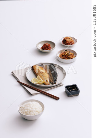 a delicious grilled mackerel table setting 115391685