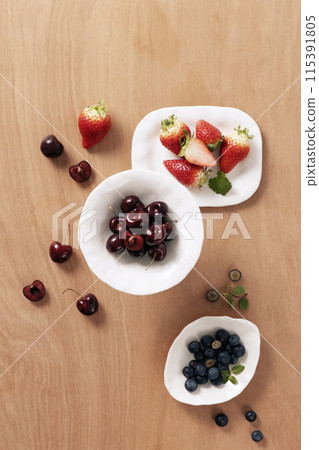 berries filled in white plates 115391805