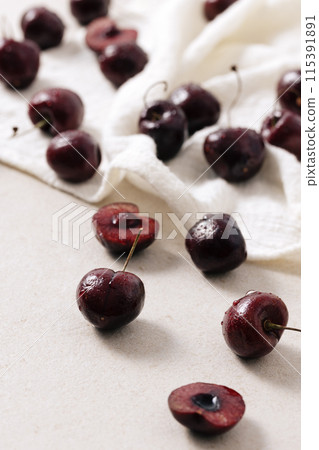 well cooked cherries scattered over the white ceiling 115391891