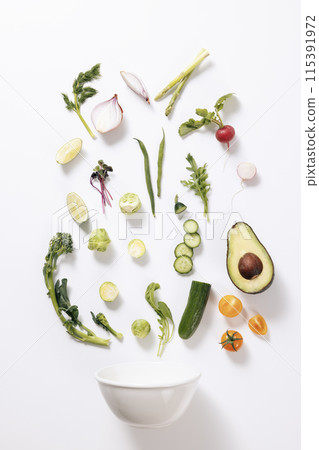 Fresh salad with white background vegetable ingredients and bowls Fresh salad with white background vegetable ingredients and bowls 115391972