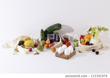 a variety of fresh salad vegetables and fruit ingredients a variety of fresh salad vegetables and fruit ingredients 115391978