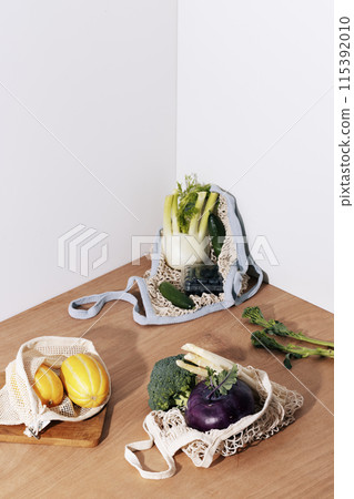 fresh salad ingredients in a net bag 115392010