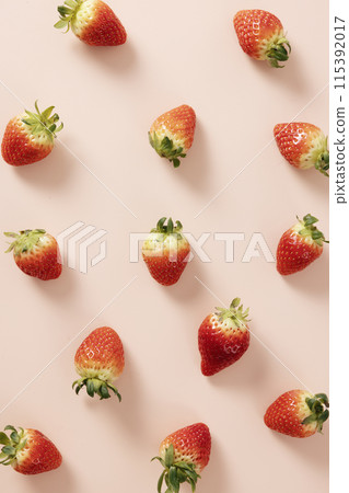 Delicious arrangement of strawberries with a light beige background 115392017