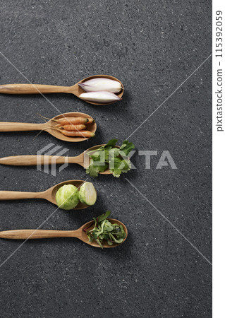 arrangement of tree cutlery with various vegetables 115392059