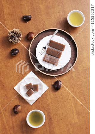 Chestnut pine nuts on the table, chestnut sweet potato dessert and tea 115392317