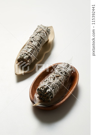 Smudge Stick on a Small Dish 115392441