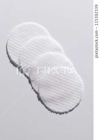 A circular toner pad overlaid on a white background 115392539