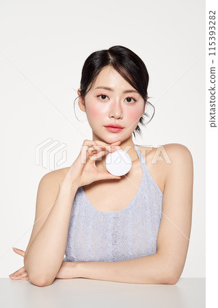 Asian Woman Poses With One Hand Cushion Fact Asian Woman Poses With One Hand Cushion Fact 115393282