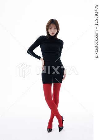 Korean Woman Poses in Black Dress and Red Leggings Korean Woman Poses in Black Dress and Red Leggings 115393478