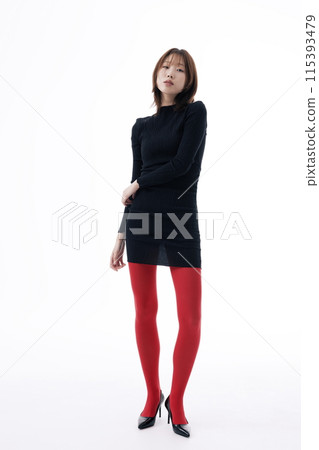 Korean Woman Poses in Black Dress and Red Leggings 115393479