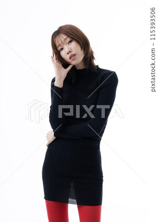 Korean Woman Wearing Black Dress and Red Leggings Korean Woman Wearing Black Dress and Red Leggings 115393506