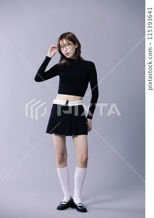 A 20s Korean Woman Wearing Geek Look and Glasses A 20s Korean Woman Wearing Geek Look and Glasses 115393641