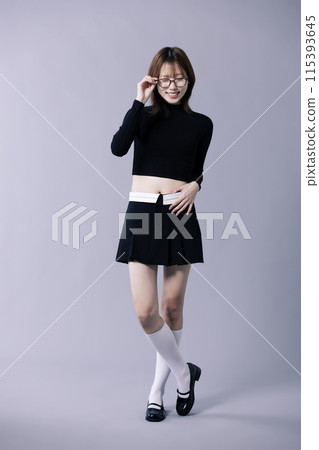 A 20s Korean Woman Wearing Geek Look and Glasses 115393645