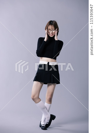 A 20s Korean Woman Wearing Geek Look and Glasses 115393647