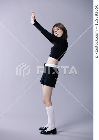A 20s Korean Woman Wearing Geek Look and Glasses 115393650