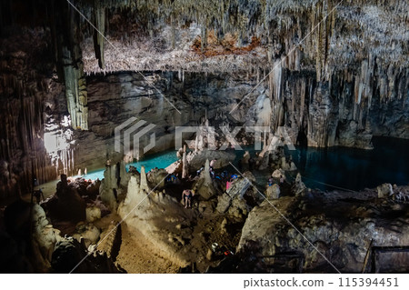 underground Cenote Choj Ha. Cave with stalactites and stalagmites. Valladolid, Mexico 115394451