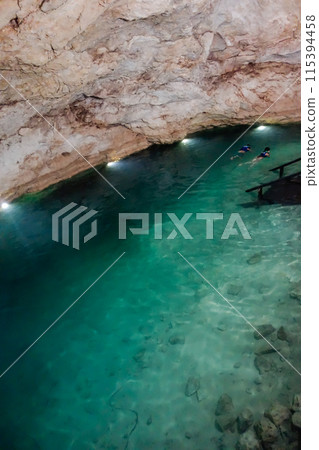 amazing natural pool of clear waters of Cenote Santa Barbara, in Homun, Mexico 115394458