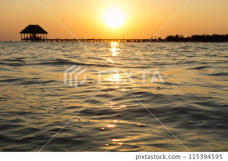 beautiful sunset over the sea on Holbox island, Quintana Roo, Mexico beautiful sunset over the sea on Holbox island, Quintana Roo, Mexico 115394595