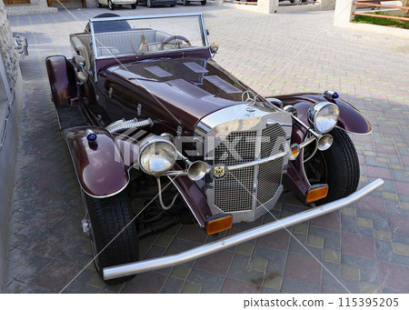 An open German retro premium sport car from the 30s of the 20th century 115395205