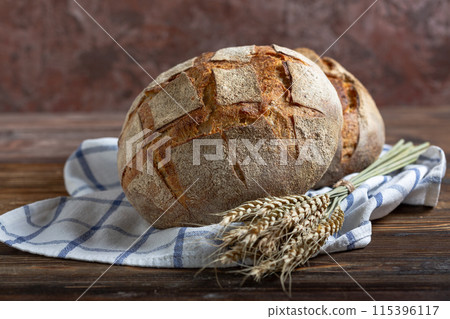 Two loaves of artisanal sourdough bread. 115396117