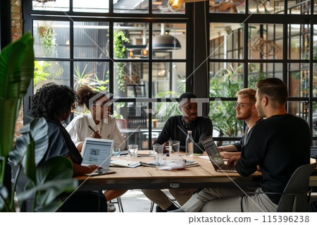 Diverse business people having a team meeting in an office. Group of happy business professionals 115396238