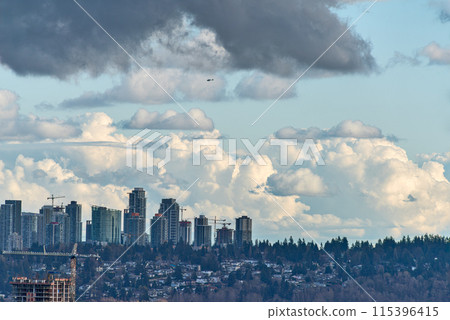 Surrey downtown view on cloudy sky background Surrey downtown view on cloudy sky background 115396415
