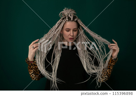 Woman With Long White Hair and Leopard Print Jacket 115396898