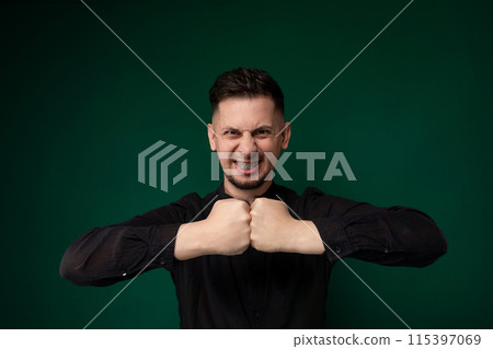 Man Making Fist Gesture With Hands Man Making Fist Gesture With Hands 115397069