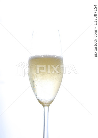 A flute glass with well-chilled champagne (sparkling wine) A flute glass with well-chilled champagne (sparkling wine) 115397154