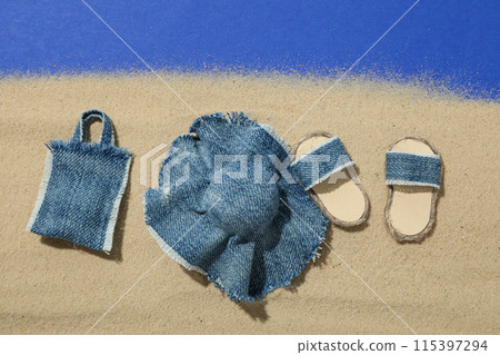 Miniature summer things for relaxing on the beach, near the sea. Miniature summer things for relaxing on the beach, near the sea. 115397294