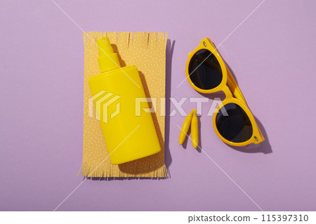 Means for safe tanning, on the background of the sea, flatlay. 115397310