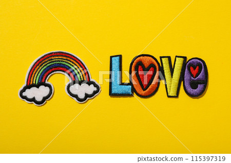 LGBT parade concept, free love symbol on yellow background. 115397319