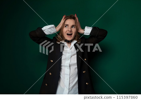 Woman Covering Ears With Hands Woman Covering Ears With Hands 115397860