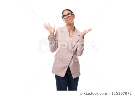 successful pretty 30 year old business woman with black hair wearing a beige jacket on a white 115397972
