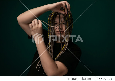 Woman With a Voluminous Hairdo Woman With a Voluminous Hairdo 115397995