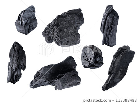 Natural organic wooden charcoal pieces isolated on white background. Set of various charcoal for design. 115398488
