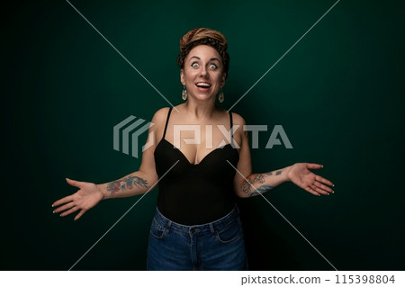 Woman in Black Tank Top With Arms Outstretched 115398804