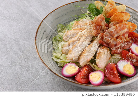 Caesar Salad: Classic salad with romaine lettuce, croutons, Parmesan, and Caesar dressing. Caesar Salad: Classic salad with romaine lettuce, croutons, Parmesan, and Caesar dressing. 115399490