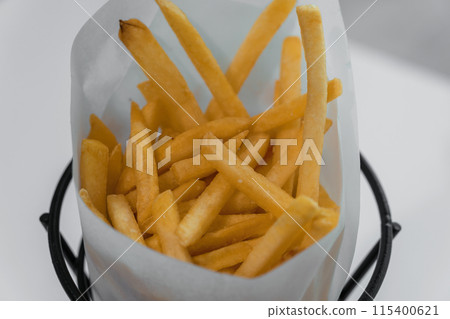 French fries with ketchup on a stand French fries with ketchup on a stand 115400621