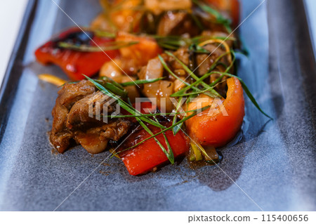 Stewed meat with vegetables and mushrooms 115400656