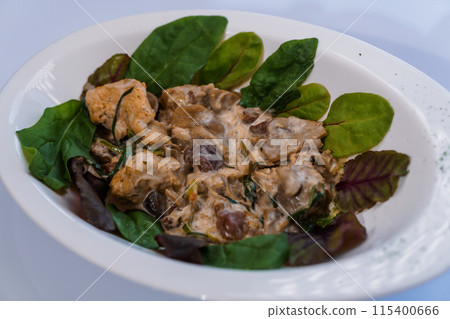 Stewed meat with vegetables and mushrooms Stewed meat with vegetables and mushrooms 115400666