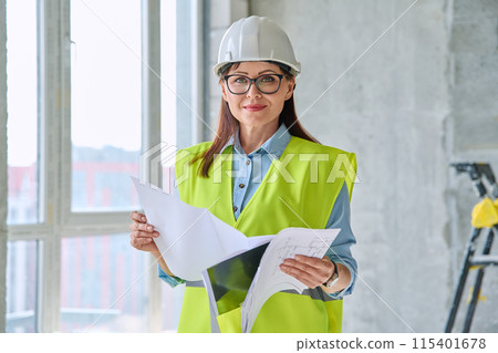 Portrait of woman builder engineer supervisor at construction Portrait of woman builder engineer supervisor at construction 115401678