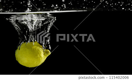 Fresh fruit falling into the water. Organic fruits for making effective juices for dieting. 115402006