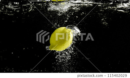 Fresh fruit falling into the water. Organic fruits for making effective juices for dieting. Fresh fruit falling into the water. Organic fruits for making effective juices for dieting. 115402029