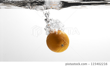 Fresh fruit falling into the water. Organic fruits for making effective juices for dieting. Fresh fruit falling into the water. Organic fruits for making effective juices for dieting. 115402216