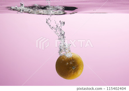 Fresh fruit falling into the water. Organic fruits for making effective juices for dieting. Fresh fruit falling into the water. Organic fruits for making effective juices for dieting. 115402404